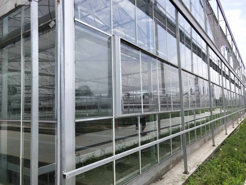 glass greenhouse with ventilation system